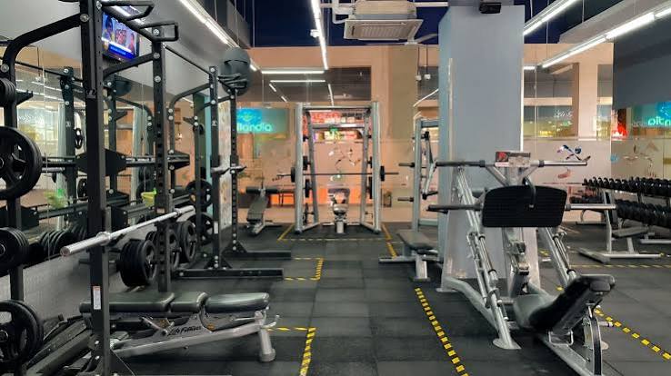 Strength training equipment in a modern gym